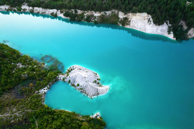 High angle view of island amidst sea