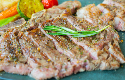 Close-up of meat on barbecue grill