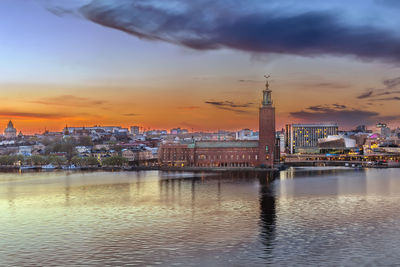 View of city hall of stockholm from the sodermalm island on the sunset, sweden