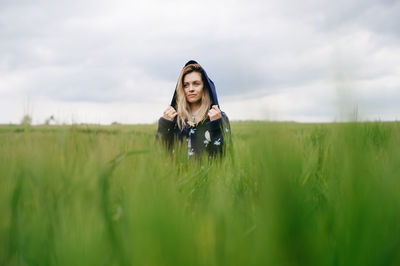 Full length of woman on field