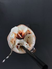 Close-up of ice cream against black background