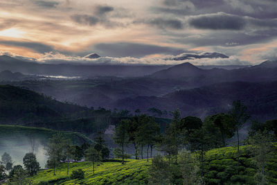 Scenic view of landscape against sky during sunset