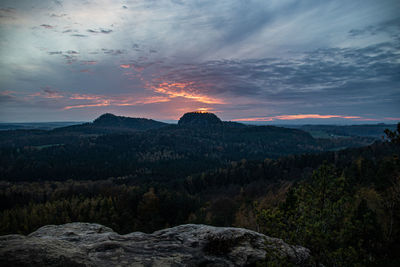 Scenic view of mountains against sky during sunset