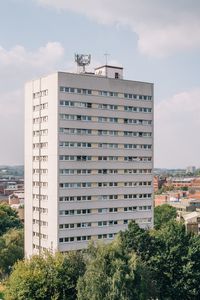 Low angle view of modern building against sky