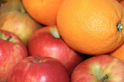 Full frame shot of oranges and apples
