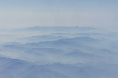 Scenic view of fog against sky