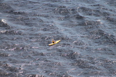 High angle view of canoe in sea