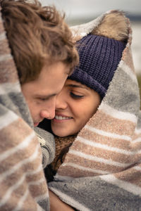 Portrait of a smiling young woman in winter