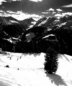 Scenic view of snow covered mountains