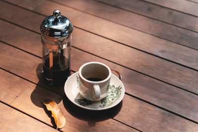 High angle view of coffee cup on table