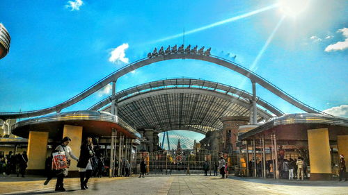 People standing in front of built structure