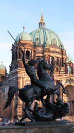 Sculptures against berlin cathedral