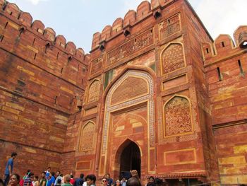 Tourists in front of historical building