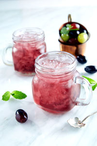 Close-up of drink in glass jar on table