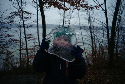 Woman holding ice