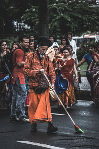 People standing on street in city