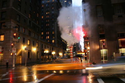 Traffic on city street at night