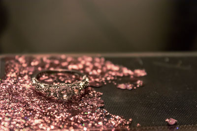 Close-up of ring on table