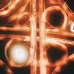 High angle view of illuminated lights at night