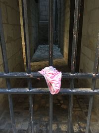 High angle view of pink umbrella on abandoned building