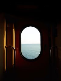 View of sea through airplane window