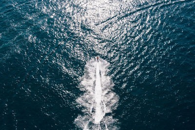 High angle view of wake at sea