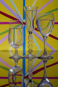 Close-up of glasses on table