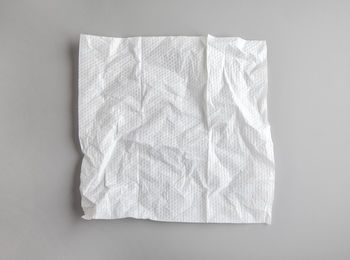 Close-up of paper against white background