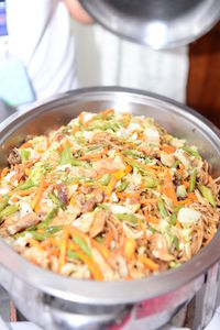 High angle view of meat in cooking pan on table