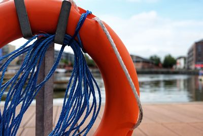 Close-up of fishing boat moored at harbor