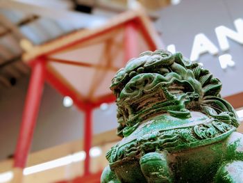 Close-up of statue against blurred background