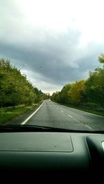 Road seen through car windshield