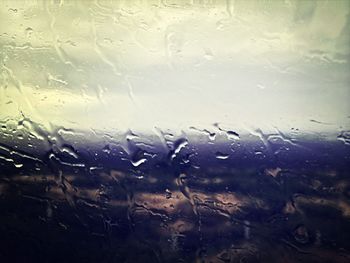 Full frame shot of water drops on glass