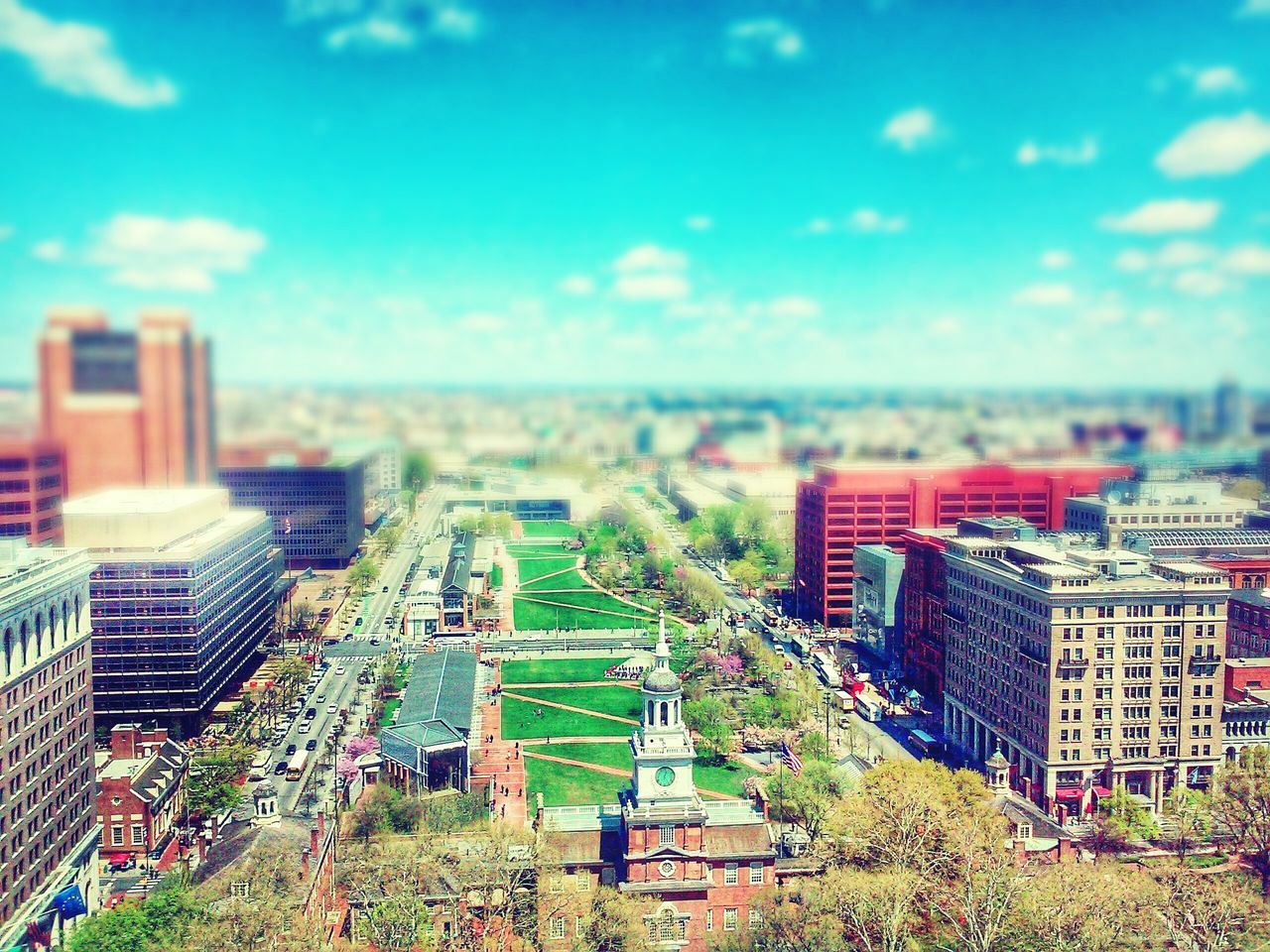 building exterior, city, architecture, built structure, cityscape, high angle view, sky, tree, residential district, crowded, skyscraper, residential building, residential structure, city life, growth, green color, tower, day, office building, cloud - sky