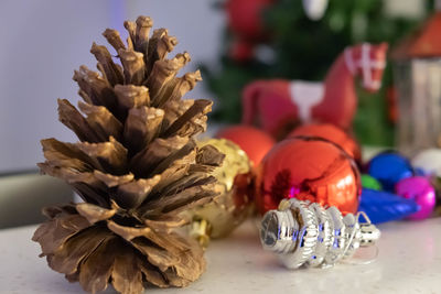 Close-up of christmas decorations on table