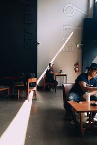 View of people sitting on chair