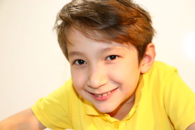 Close-up portrait of smiling boy