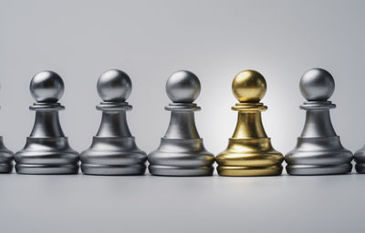 Close-up of chess against white background