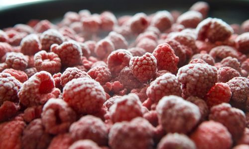 High angle view of raspberries for sale at market