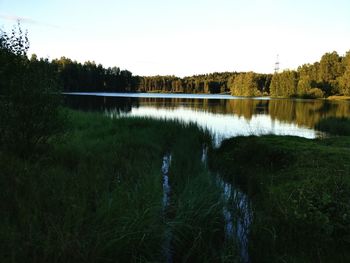 Scenic view of lake against clear sky