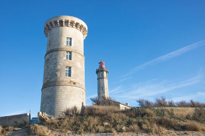 Low angle view of lighthouse against sky