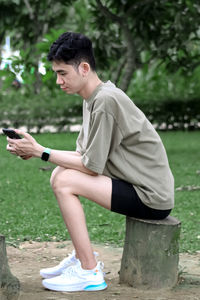 Young woman using mobile phone