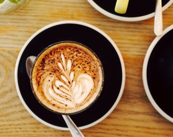 High angle view of cappuccino on table