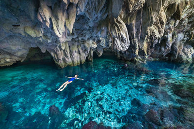 Woman swimming in sea