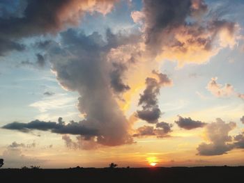 Scenic view of dramatic sky during sunset