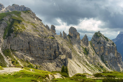 Low angle view of rocks against sky