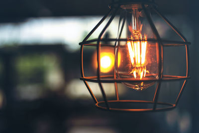 Close-up of illuminated light bulb