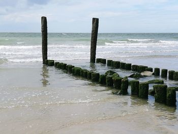Scenic view of beach against sky
