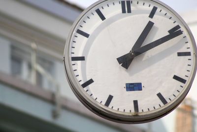 Low angle view of clock