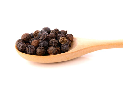 Close-up of cake against white background